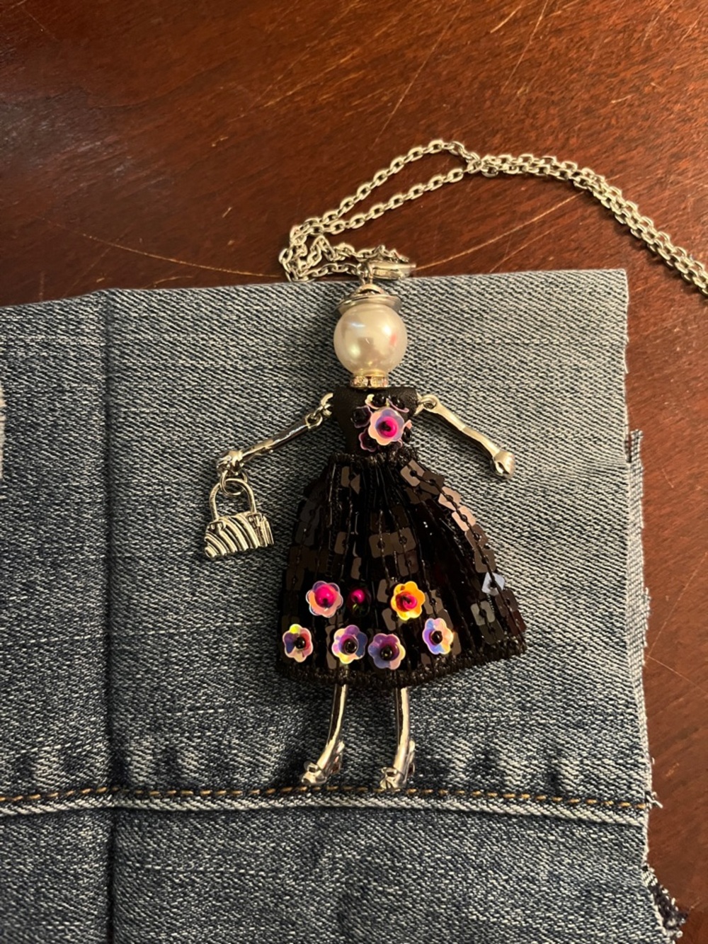 Coco + Carmen Black Doll Pendant Necklace with Pink & Purple Flower Accents - Picture 2 of 9
